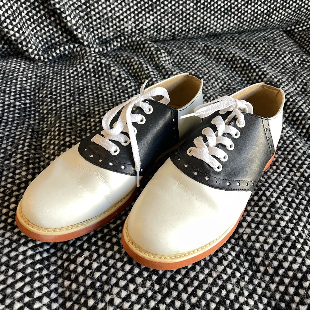 Muffy's black and white saddle shoes